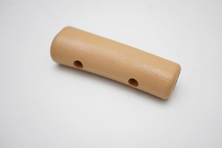 beige plastic handle for handbrake